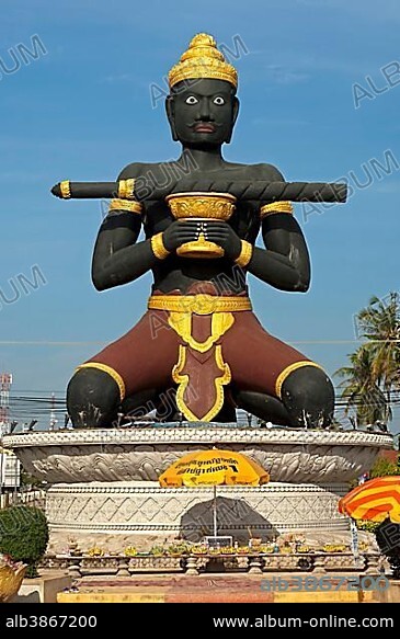 Statue of Ta Dambong, a black man with a magic wand, symbol of the provincial capital of Battambang, Cambodia, Southeast Asia, Asia.