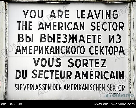 Replica of the sign at Checkpoint Charlie, "you are leaving the American Sector", Berlin, Berlin, Germany, Europe.