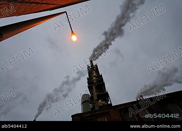 Smoking chimney of a factory, Sachtleben Chemie, Duisburg-Homberg, Ruhrgebiet region, North Rhine-Westphalia, Germany, Europe.