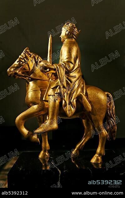 Small, gold-plated statue of Charlemagne riding a horse, Stiftsmuseum Museum Xanten monastery museum, Xanten, Niederrhein region, North Rhine-Westphalia, Germany, Europe.