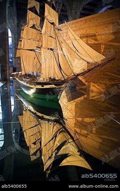 Model of a sailing boot reflecting in a mirror, Maritime Museum, Barcelona, Catalonia, Spain, Europe.
