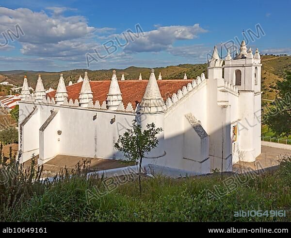 Architectural details of conical roof decorations historic whitewashed church Igreja Matrix in medieval village of Mértola, Baixo Alentejo, Portugal, Southern Europe, Europe.