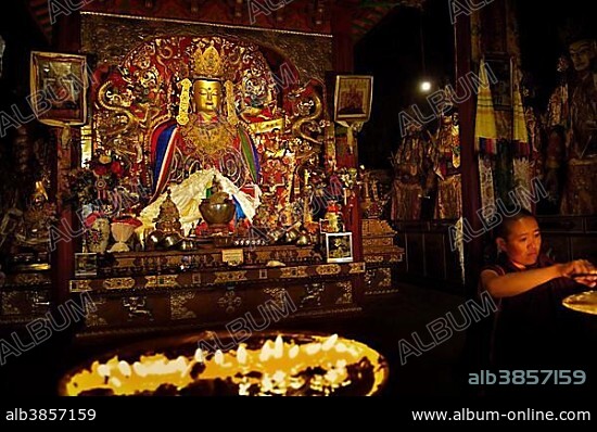 Cult figure and yak butter lamps, monastery Samye near Lhasa, Tibet, Asia.