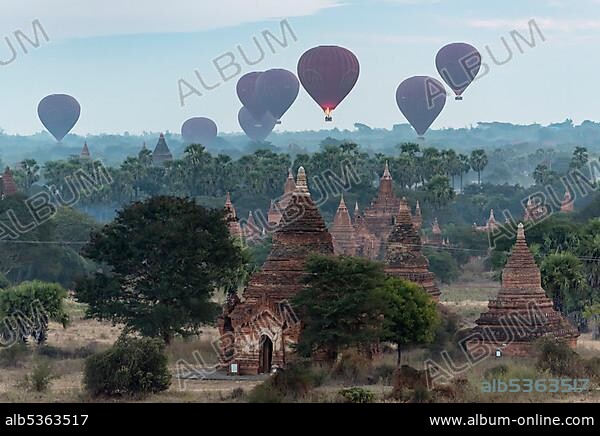 Hot air balloons over the temples of Bagan, seen from Buledi Pagoda, Burma, Myanmar, Asia.