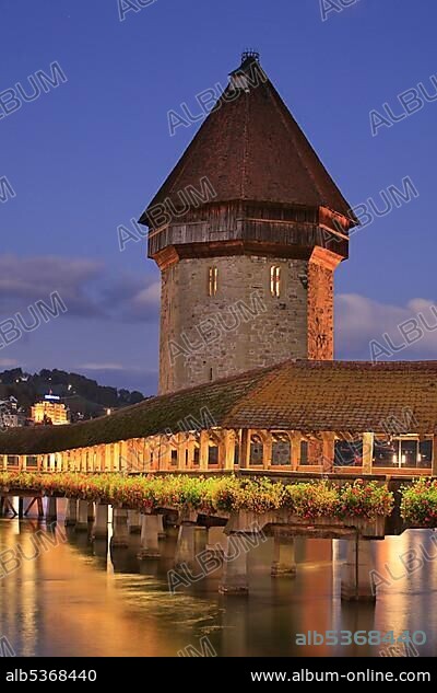 Kapell Bridge with Water Tower at dusk, Lucerne, Switzerland, Europe.