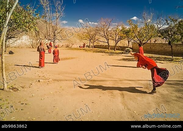 Hemis, Ladakh, circa November 2011: Photo of monks playing cricket at Tibetan Buddhist monastery in Hemis, Ladakh. Documentary editorial.