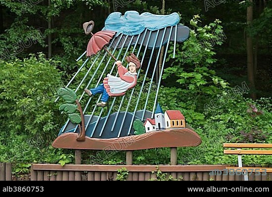 Character from "The History of the Flying Robert", from the "Struwwelpeter" children's book by Heinrich Hoffmann, carved in wood by Guenther Gerke, Struwwelpeter Park, Tabarz, Thuringia, Germany, Europe.