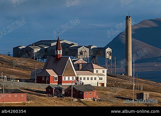 Northernmost Church in the World, Church Svalbard Kirke in front of a former coal mine and vent of the thermal power plant, Longyearbyen, Spitsbergen, Svalbard, Norway, Europe.