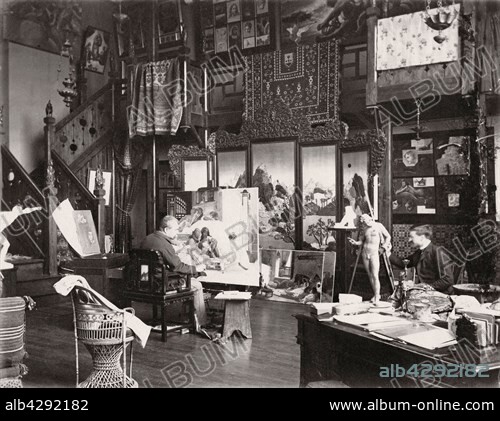 French Orientalist painter Jean-Jules-Antoine Lecomte du Nouÿ in his Paris studio finishing the central panel of the triptych 'Ramsès dans son harem'.. Photograph by Edmond Bénard c.1885. Albumen print.. Jean-Jules-Antoine Lecomte du Nouÿ (1842-1923).