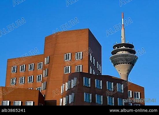 Rhine Tower with Gehry buildings, Neuer Zollhof, Media Harbour, Düsseldorf, North Rhine-Westphalia, Germany, Europe.