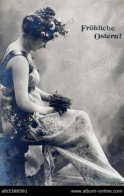 Woman holding nest with young bird, lettering "Froehliche Ostern", German for 'Happy Easter', historic postcard, around 1900, kitsch.