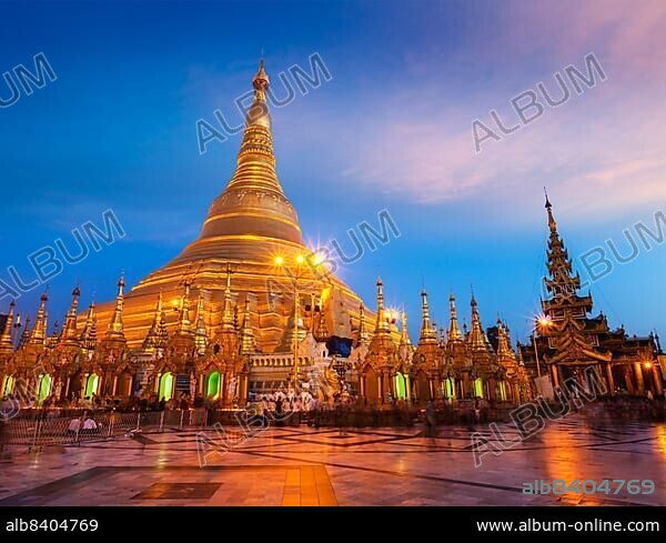 Myanmer famous sacred place and tourist attraction landmark, Shwedagon Paya pagoda illuminated in the evening. Yangon, Myanmar Burma.