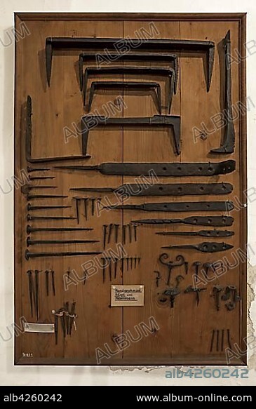 Board with hand-forged nails and staples, Deutsches Hirtenmuseum or German Shepherds Museum, Hersbruck, Middle Franconia, Bavaria, Germany, Europe.