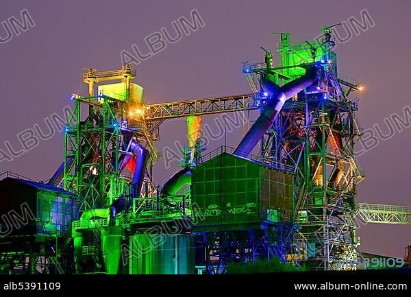 Industrial monument Thyssen Hochofenwerk Eisenhuette Meiderich, Thyssen Ironworks Meiderich, Landschaftspark Duisburg-Nord, bathed in neon light, HDR photograph, North Rhine-Westphalia, Germany, Europe.