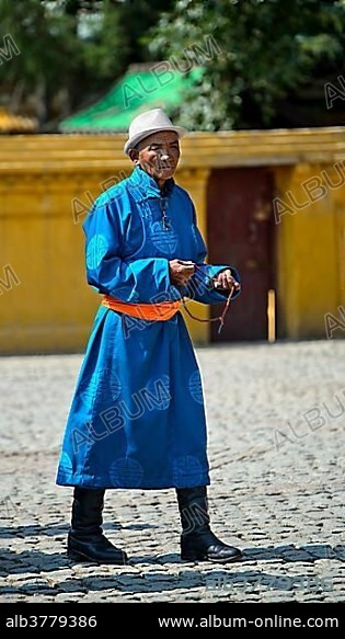 Mongolian man in traditional clothing, Deel, Gandan Monastery, Ulaanbaatar, Mongolia, Asia.