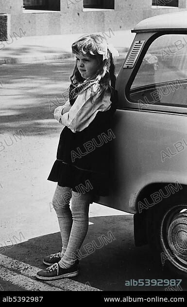 Girl with a Trabant 601 car, circa 1986, GDR, East Germany, Europe.
