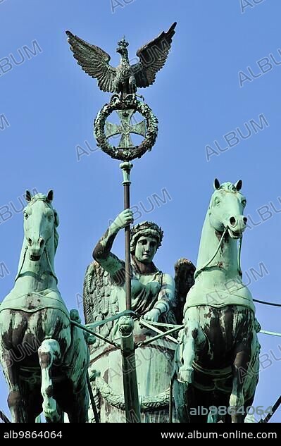 Atop the Brandenburg gate is the Quadriga, a chariot drawn by four horses driven by Victoria, the Roman goddess of victory.