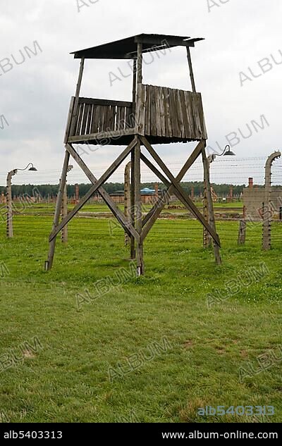 Fence and guard tower in the concentration camp, Auschwitz-Birkenau, Poland, Europe.