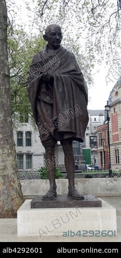 Bronze statue of Mahatma Gandhi (1869-1930) leader of Indian independence movement in British-ruled India. Employing nonviolent civil disobedience, Gandhi led India to independence and inspired movements for civil rights and freedom across the world. Parliament Square, London.