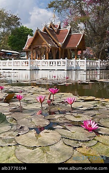 Thai temple Wat Nam Hoo, surrounded by water with lotus flowers near Pai, Thailand, Asia.