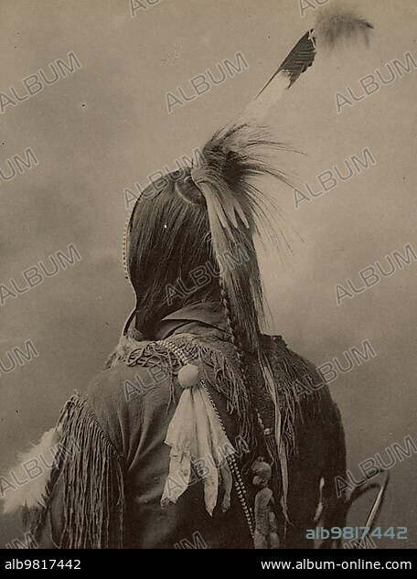Indian; Omaha; dancing bonnet and hair ornament; feather; after a picture by F.A.Rinehart; 1899; Omaha are a North American Indian tribe from the Dhegiha branch of the Sioux language family; Historic; digitally restored reproduction of an original from the period.