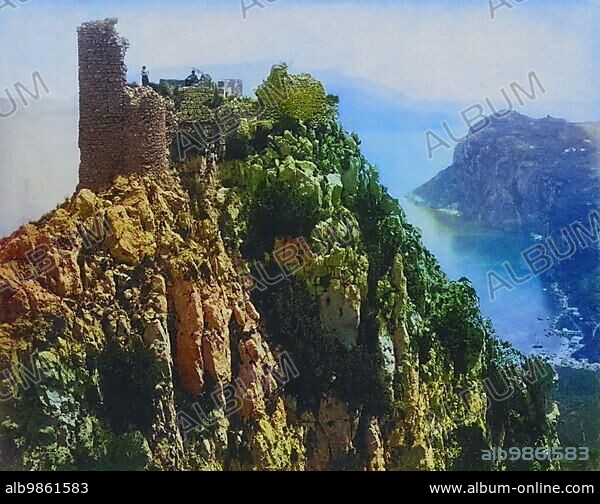 View of the ruins of Castello Barbarossa on Capri with a man and a woman on top, 1865, Italy, Historic, digitally restored reproduction of a photo by Giorgio Sommer, coloured, Europe.
