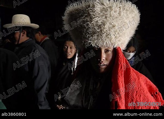Nomadic Tibetan woman wearing fur hat, Western Tibet, Ngari Province, Tibet (China), Asia.