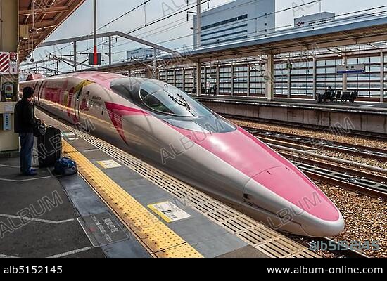 Hello Kitty Shinkansen, high speed train stops at platform, railway station, Hiroshima, Japan, Asia.