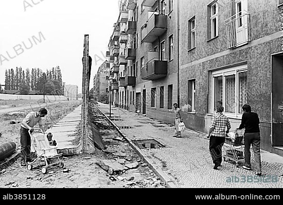 Remains of the Berlin Wall between Neukoelln, right, and Treptow, Berlin Wall Heidelberger Strasse road, Berlin, Germany, Europe.