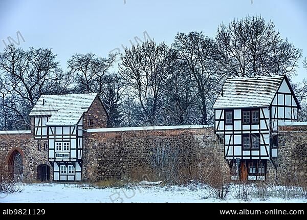 Medieval city wall with Wieck houses in winter; Neubrandenburg; Mecklenburg-Western Pomerania; Germany; Europe.
