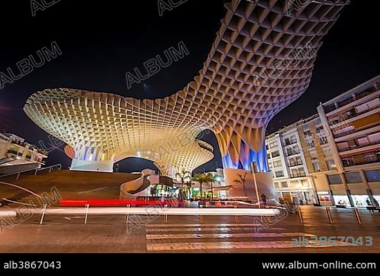 Modern architecture, wooden structure Metropol Parasol, illuminated, with traces of light at night, Plaza de la Encarnacion, Sevilla, Andalusia, Spain, Europe.