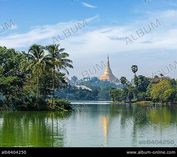 Travel Myanmar tourism background, view of Shwedagon Pagoda over Kandawgyi Lake in Yangon, Burma Myanmar.