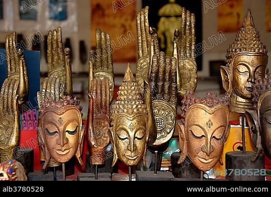 Souvenirs, masks, Buddhas, face, hand, Vientiane, Laos, Southeast Asia, Asia.