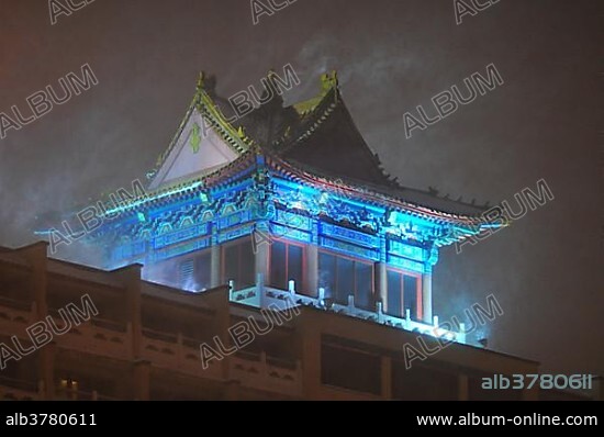 Rooftop pagoda on a modern building during a snowstorm, MontrÃ©al, Quebec Province, Canada, North America.
