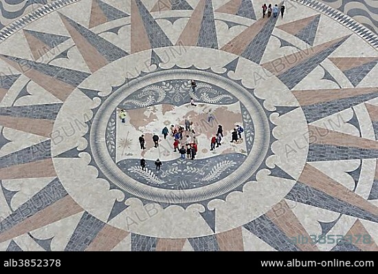Compass rose with world map in the pavement in front of the Padrao dos Descobrimentos, Monument to the Discoveries, Belem, Lisbon, Lisbon District, Portugal, Europe.