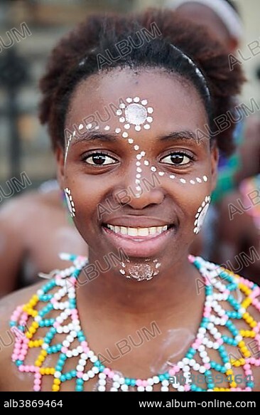 Portrait of Xhosa woman with traditional adornment, Grahamstown, Eastern Cape, South Africa, Africa.