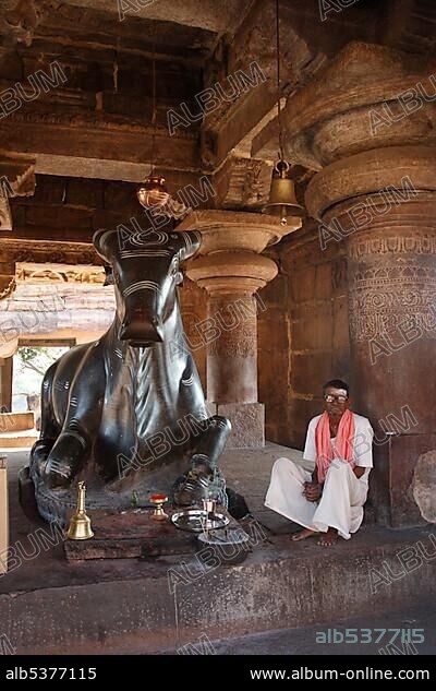 Guardening the sacred bull Nandi in a temple dedicated to Shiva, at the ancient site of Pattadakal, Karnataka, India, Asia.