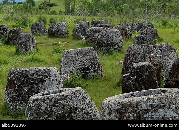 Archeology, large ancient stone jars in the landscape, Plain of Jars, Jar Site 1, Thong Hai Hin, at Phonsavan, Xieng Khouang province, Laos, Southeast Asia, Asia.