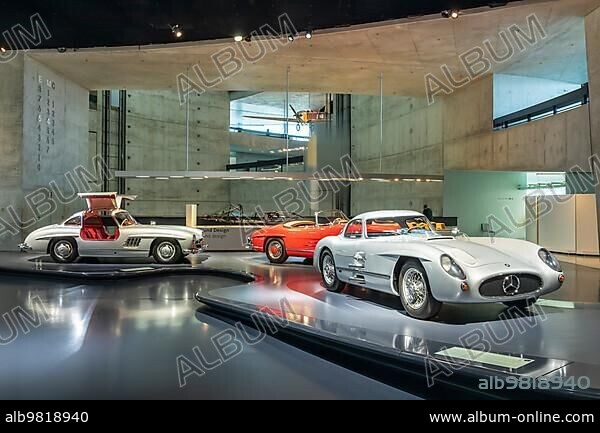 From left Mercedes-Benz 300 SL Coupe (1955) Gullwing; 300 SL Roadster (1962); 300 SLR Uhlenhaut-Coupe (1955); Mercedes Museum; Stuttgarts most visited museum is part of the Mercedes-Benz World in Untertürkheim and reminds us with its vehicles and classic cars of the early days of the automobile; Architecture Ben van Berkel; Architekturbüro UNStudio; Stuttgart; Baden-Württemberg; Germany; Europe.