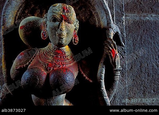 Women's sculpture decorated with kumkum powder, entrance of Minakshi, Meenakshi or Sri-Minakshi-Sundareshwara Temple, Madurai, Tamil Nadu, South India, India, Asia.