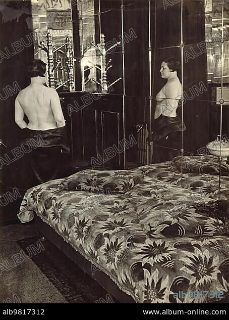 Prostitution; Woman in a brothel; c. 1920; Historic; digitally restored reproduction from a 19th century original.