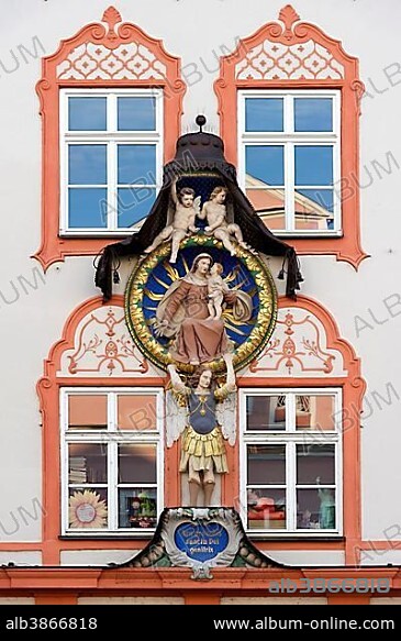 Rococo plasterwork of a medallion, Virgin Mary with child, cherubs and the Archangel Gabriel, on a town house in the old town, Landshut, Lower Bavaria, Bavaria, Germany, Europe.