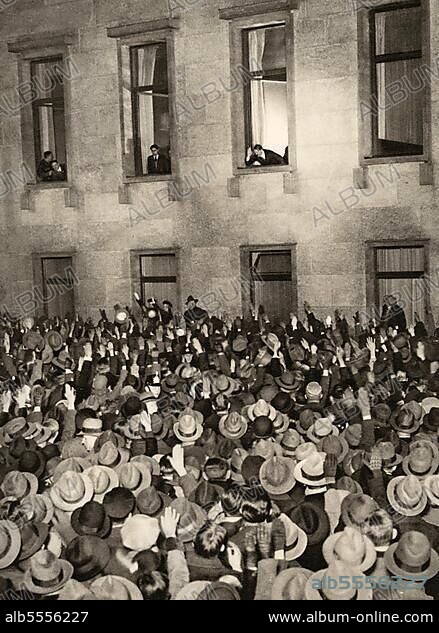 Adolf Hitler (* 20 April 1889 in Braunau am Inn) († 30 April 1945 Berlin), Leader of the Nazi Party, Reich Chancellor from 1933, also self-appointed "Fuehrer" and head of state of Germany, people with hats.