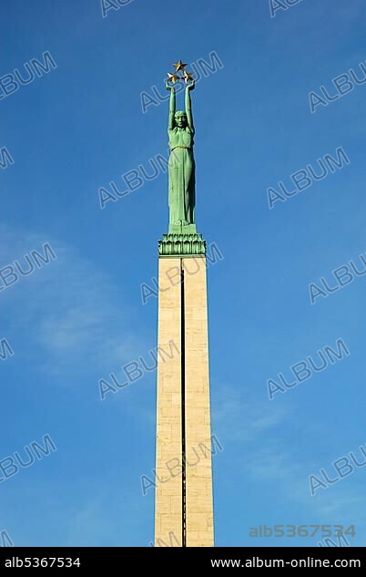 The girl Milda holding up 3 stars towards the sky, Monument, Statue of Liberty, Brivibas piemineklis in the Brivibas bulvaris Boulevard, Riga, Latvia, Baltic states, Northeastern Europe, Europe.