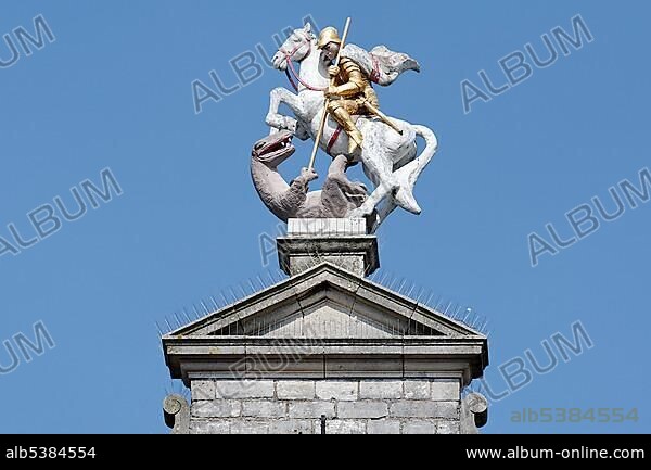 Dragon slayer equestrian statue on the roof of St. Jorisdoelen, Middelburg, Walcheren, Zeeland, Netherlands.