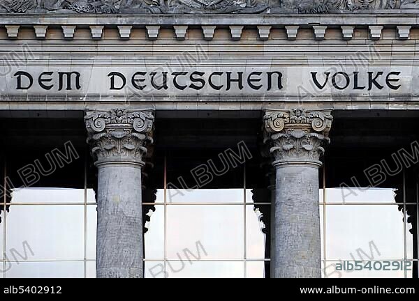 Inscription "Dem Deutschen Volke", to the German people, and relief in the tympanum above the main entrance, Reichstag building, Berlin, Germany, Europe.