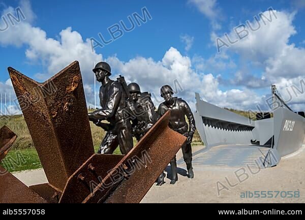 Czech hedgehog and landing craft in front of the Musée du Débarquement Utah Beach, World War II Museum in Sainte-Marie-du-Mont, Normandy, France, Europe.