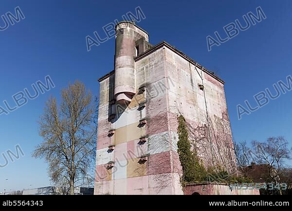 High bunker from World War 2 on the Bayer AG factory premises, façade painted pink, Leverkusen, North Rhine-Westphalia, Germany, Europe.