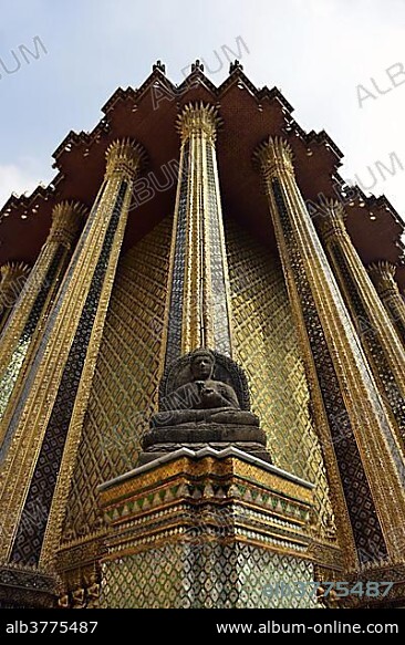 Buddha statue in front of the Mondop, a library, Wat Phra Kaeo Temple, Grand Palace, Bangkok, Thailand, Asia.