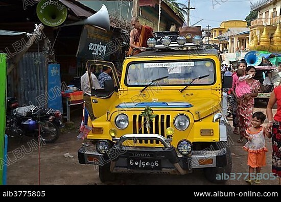 Colorfully painted pilgrims' truck, jeep takes Burmese pilgrims to Mount Popa near Bagan, Pagan, Burma, Myanmar, Southeast Asia, Asia.